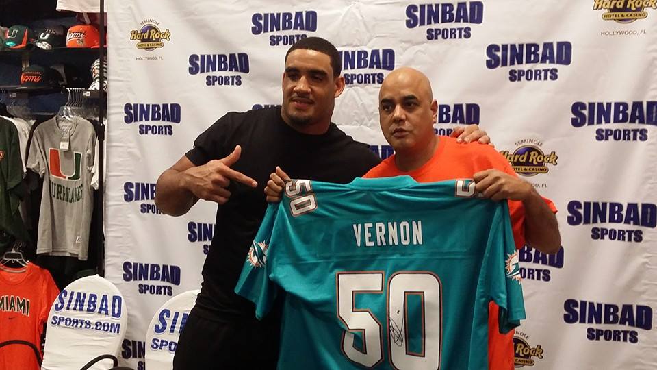 Olivier Vernon with Dolphins fan 